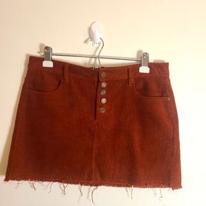 Indigo Rise corduroy rust colored raw hem mini skirt